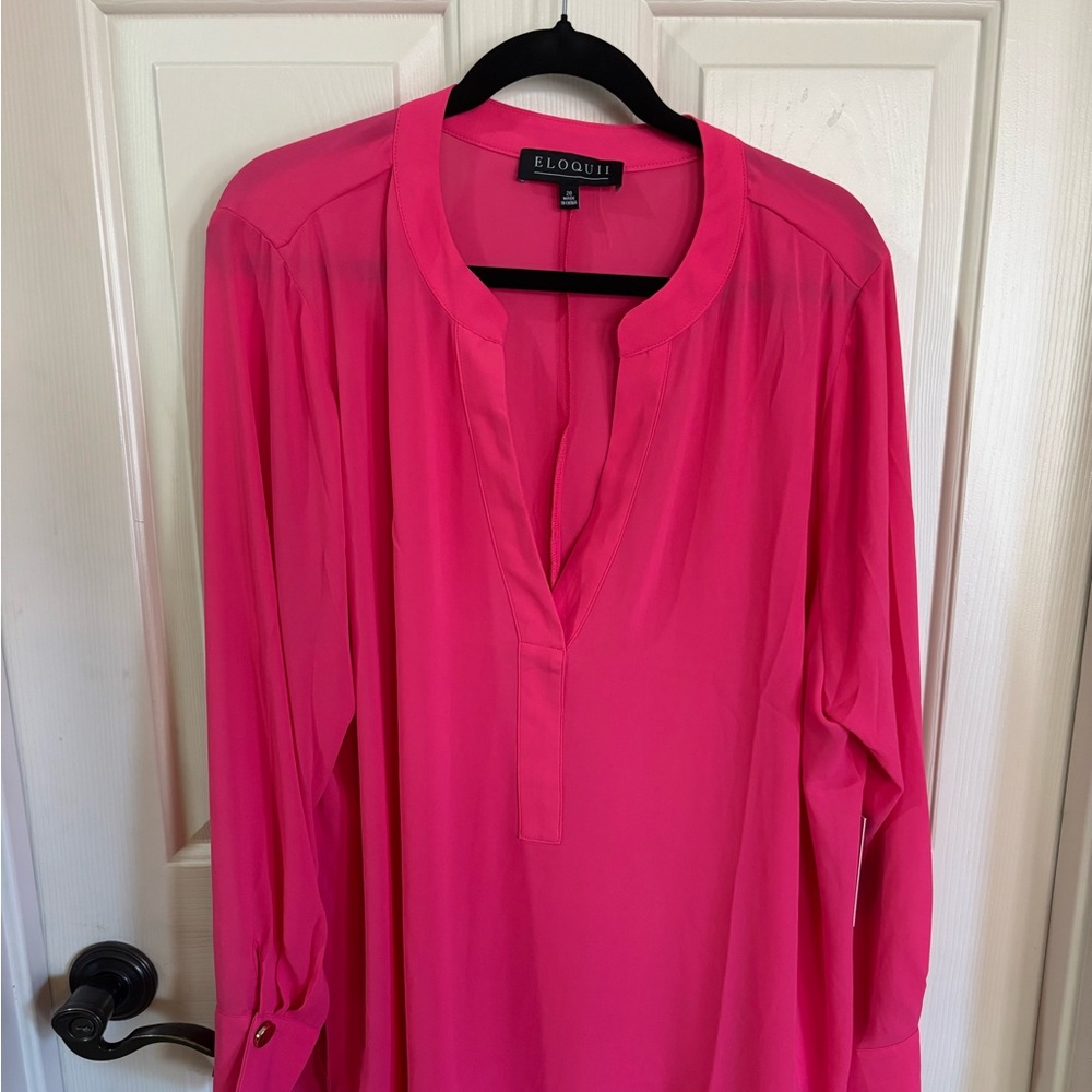 Brand new, with tag, tunic style  blouse, size 20 from ELOQUII .